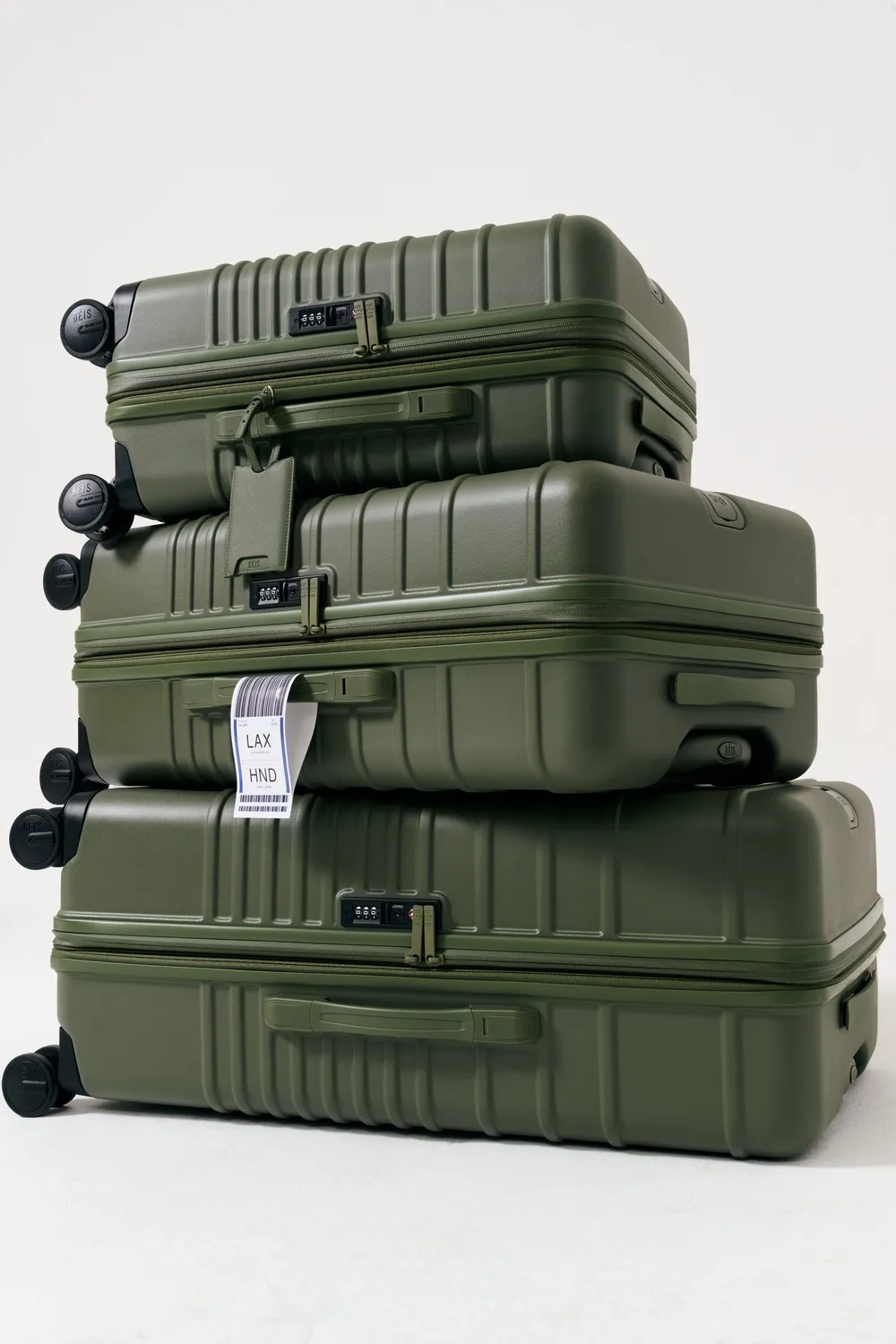 Beis Large Check-In Roller valigia oliva verde stiva