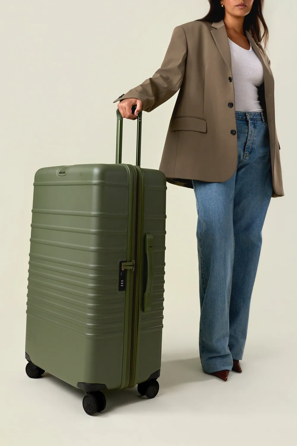 Beis Large Check-In Roller valigia oliva verde stiva